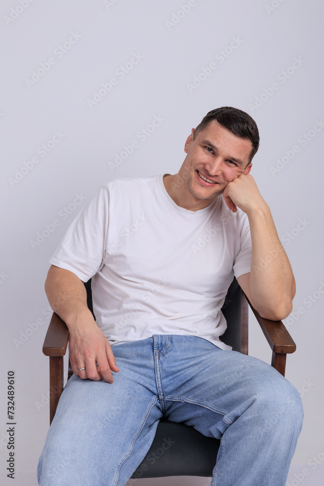 In this captivating minimalist portrait, a man emanates strength and quiet confidence. In this captivating minimalist portrait, a man emanates strength and quiet confidence.