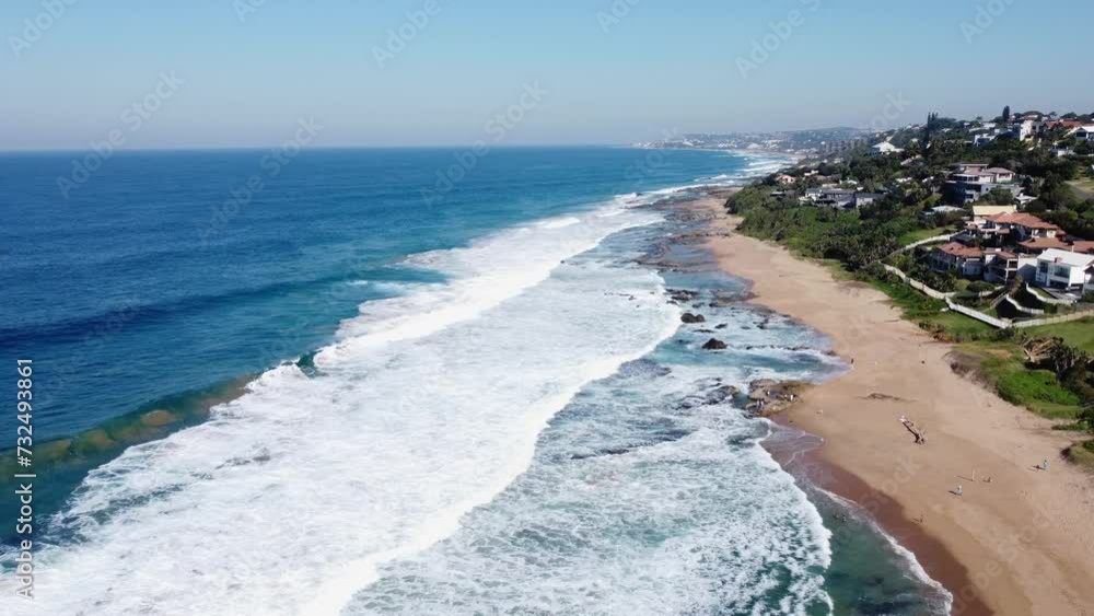 custom made wallpaper toronto digitalDrone view over foamy waves covering the sandy coastline