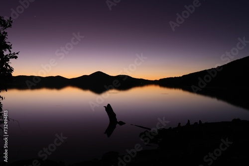 Stunning sunset illuminates the tranquil body of Lake Macquarie. New South Wales, Australia.