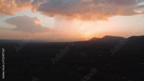Aerial Drone Footage Of Beautiful Sunset Over The mountain, gloden hour, Fuerteventura, Canary Islands, Spain.