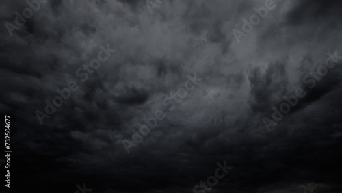 dark dramatic sky with stormy clouds before rain or snow as abstract background, extreme weather