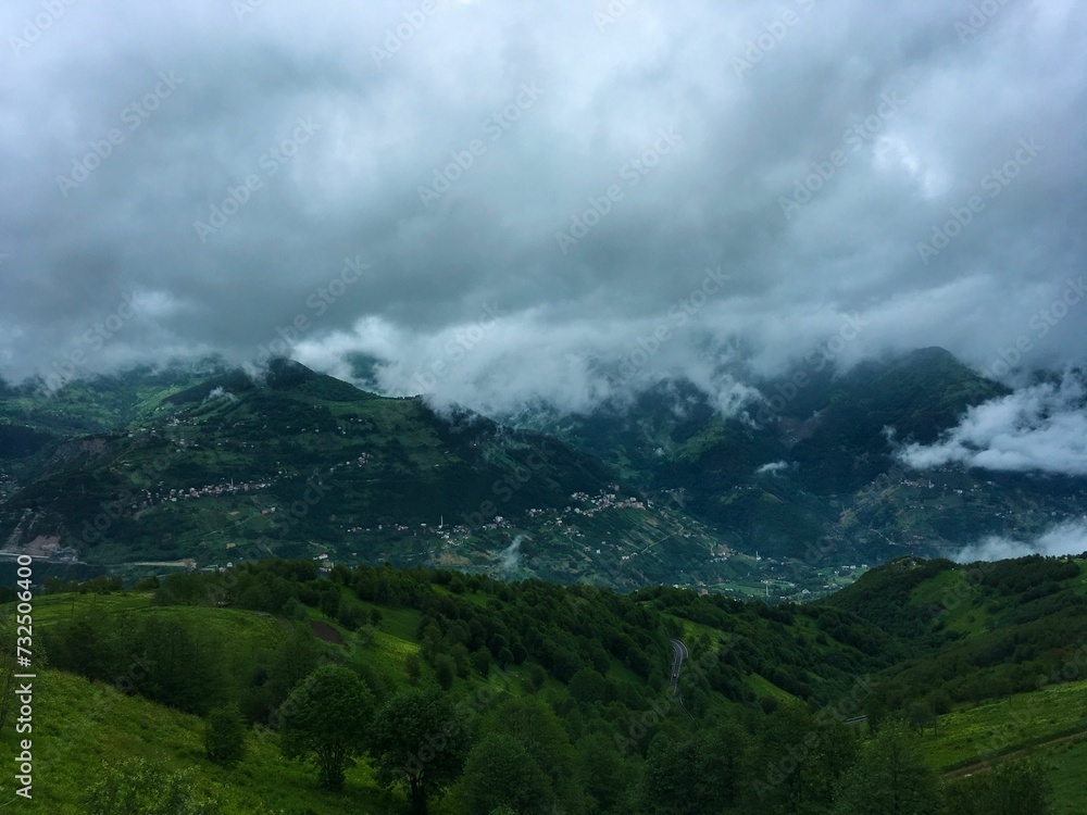 Picturesque scenic view of rolling hills, dotted with clouds in Trabzon, turkey.