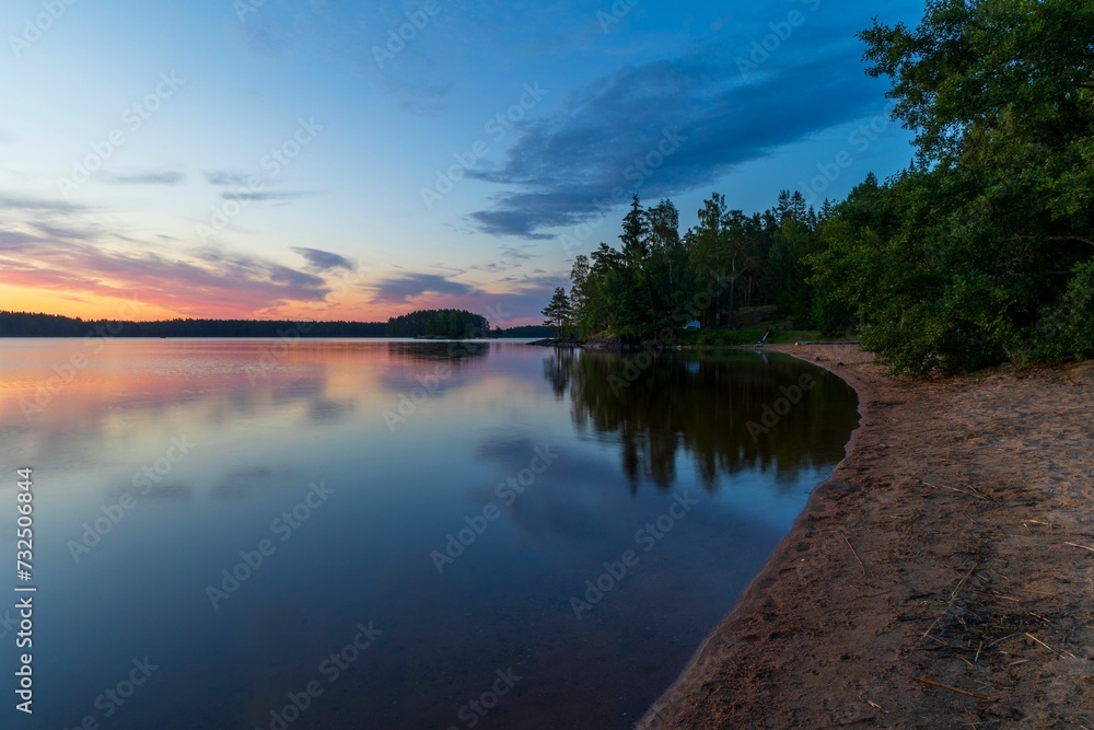 Tranquil scene of a beach at dusk. Tranquil scene of a beach at dusk.