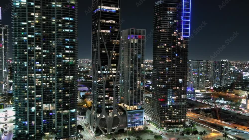 Aerial view of illuminating Skyscrapers of Downtown Miami in Florida at night Aerial view of illuminating Skyscrapers of Downtown Miami in Florida at night