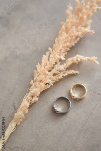 Wedding Rings On A Bouquet Of Flowers