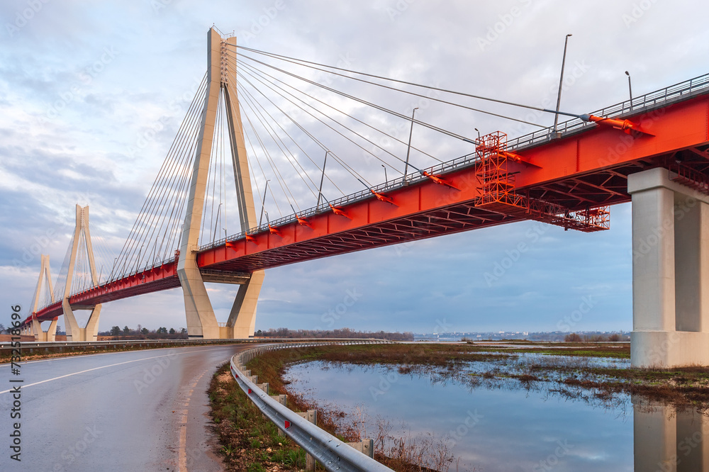 Cable-stayed bridge at sunset against a beautiful sky. Murom. Russia. Cable-stayed bridge at sunset against a beautiful sky. Murom. Russia.