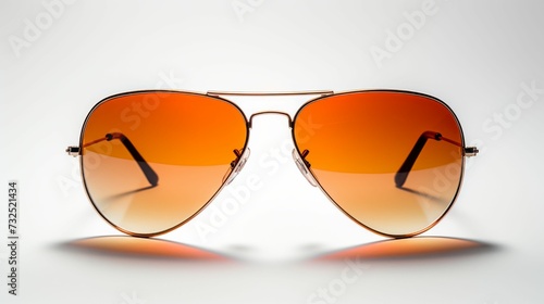 Stylish Sunglasses Resting on White Surface