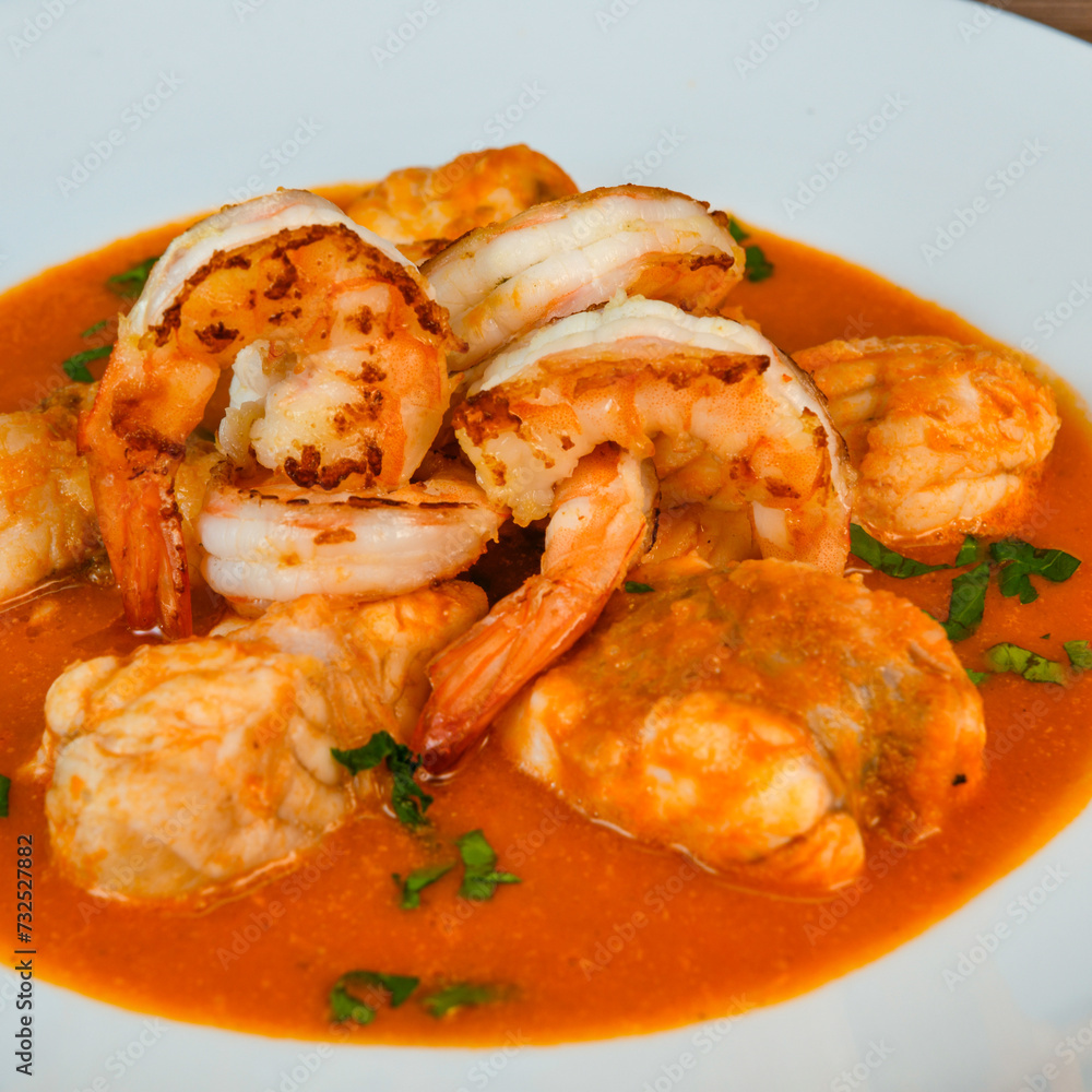 Recipe for Armorican-style monkfish tail, prawns, flambees with cognac, High quality photo Recipe for Armorican-style monkfish tail, prawns, flambees with cognac, High quality photo