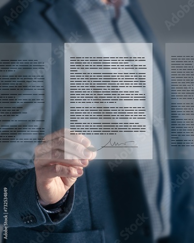 Standing man hand writing electronic signature on virtual screen. Sign contract, business agreement.
