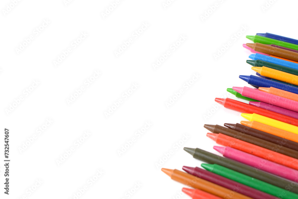 Crayons lined up isolated on white background. Crayons lined up isolated on white background.