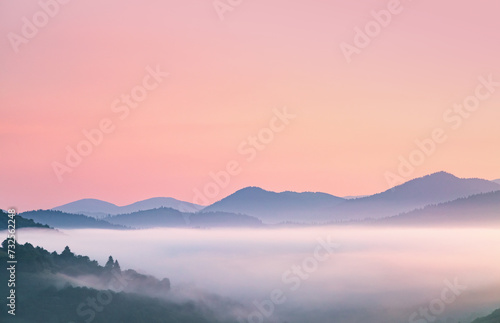 A tranquility view of the mountainous area in the haze. Carpathian National Park, Ukraine, Europe. © Leonid Tit