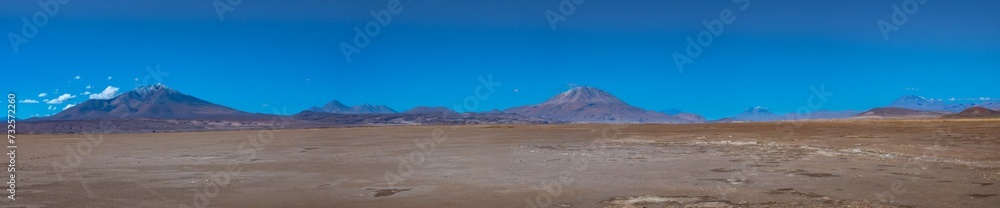 Huge deserted plains in the Salar de Chiguana surrounded by majestic volcanos, Potosi department, Bolivia