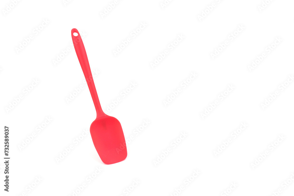 A baking spatula on a white background. kitchenware. A baking spatula on a white background. kitchenware.
