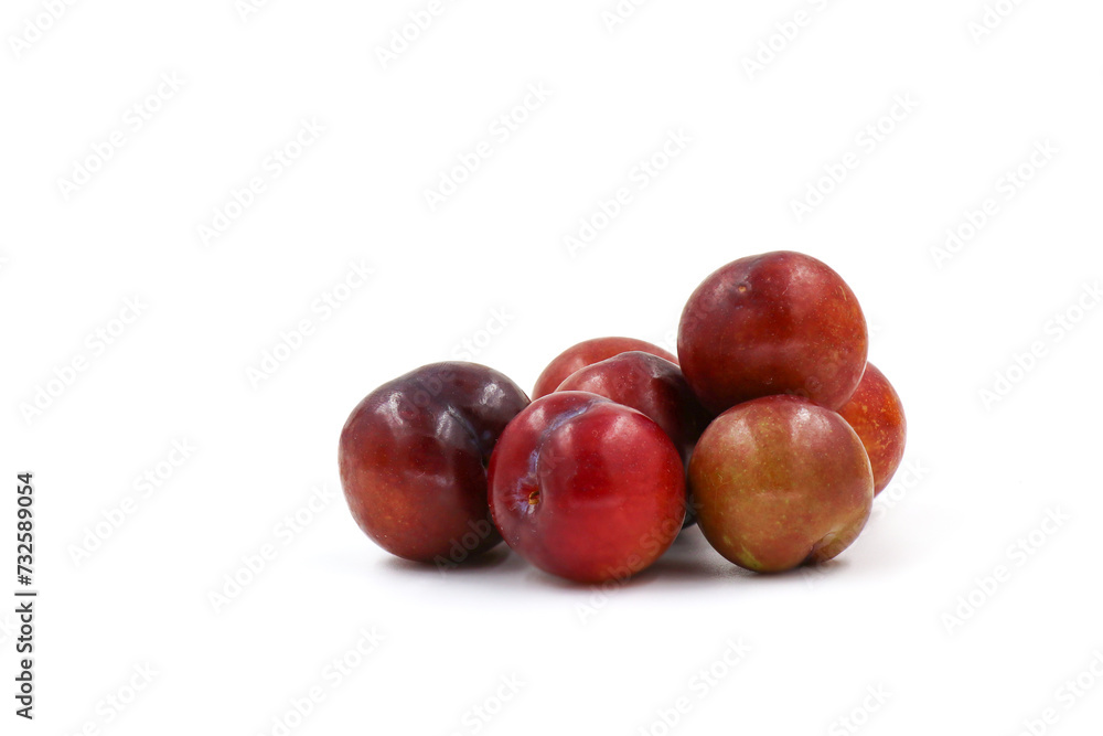 plums on a white background