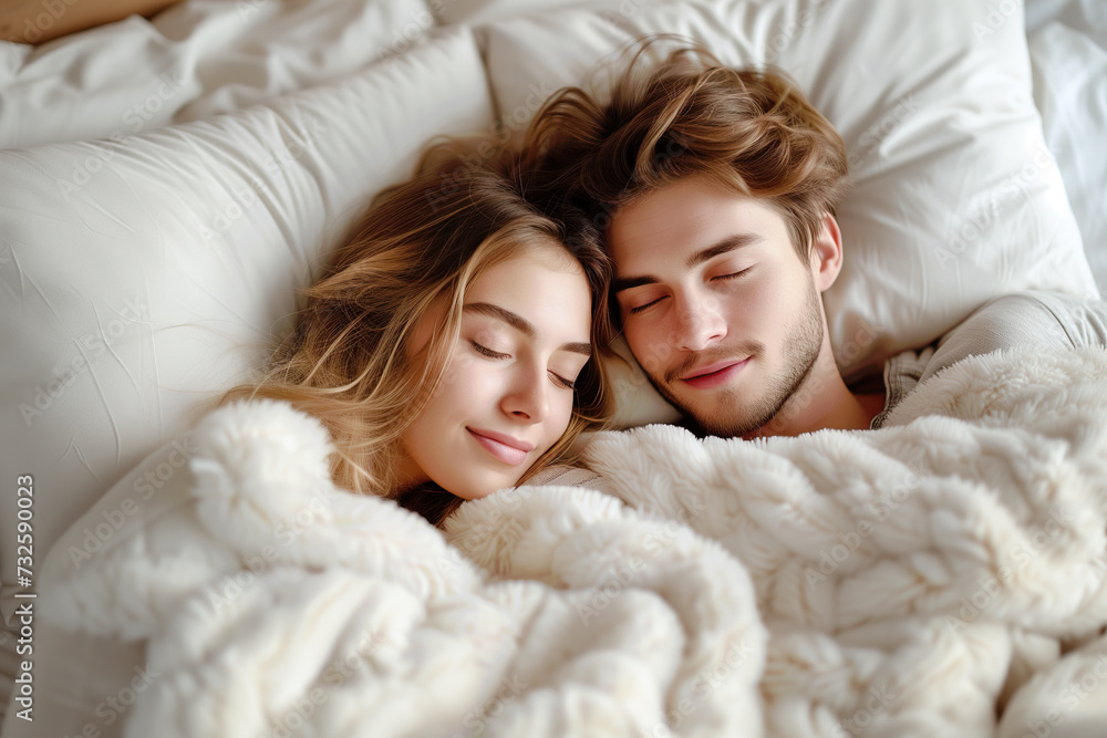 Morning Call : Young beautiful and loving couple wake up while lying on white pillows under the covers on soft white bed at the morning . Morning Call : Young beautiful and loving couple wake up while lying on white pillows under the covers on soft white bed at the morning .