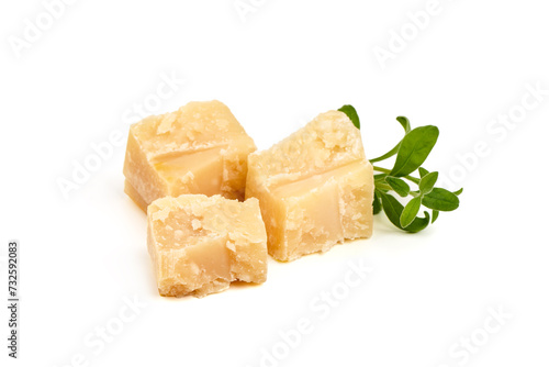 Parmesan cheese pieces, hard cheese, isolated on white background.