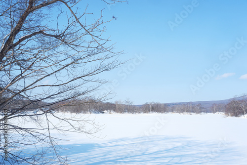 A view of the park in winter after it snows.