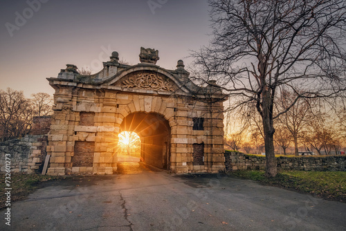 The historic gates of Belgrade's Kalemegdan fortress welcome visitors to explore centuries of Serbian history and culture amidst the summer sun. photo