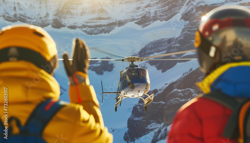 Skiers greetings Medical Rescue helicopter landing in high altitude mountains after life-threatening accident. Travel, active people, safety and Traveling insurance concept image.