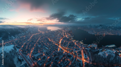 A Panoramic Aerial Glimpse into the Winter Cityscape's Evening Radiance
