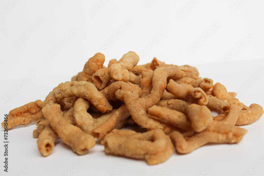 Crispy fried chicken intestines, isolated on white background Crispy fried chicken intestines, isolated on white background