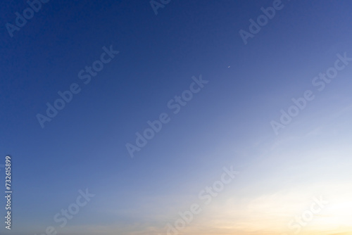 Beautiful morning or evening blue and orange sky taken at the sea used as natural blackground texture.
