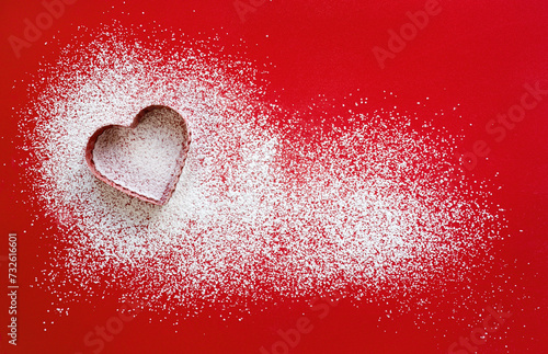 Heart Design with White Powder on Red Background