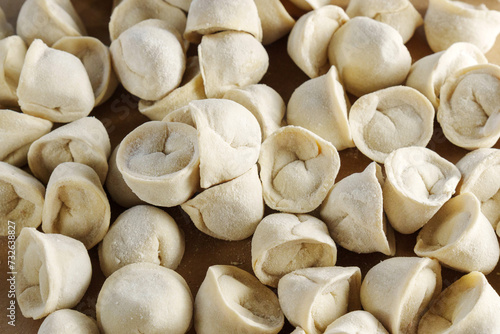 Freshly made, handcrafted dumplings and ravioli revealing the delicate folds and individual shapes of each piece.