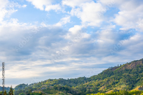 View of idyllic mountain scenery landscape in fine weather under blue sky and cloud
