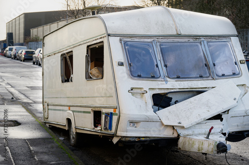 Caravan abandoned and dumped in street waiting to be removed