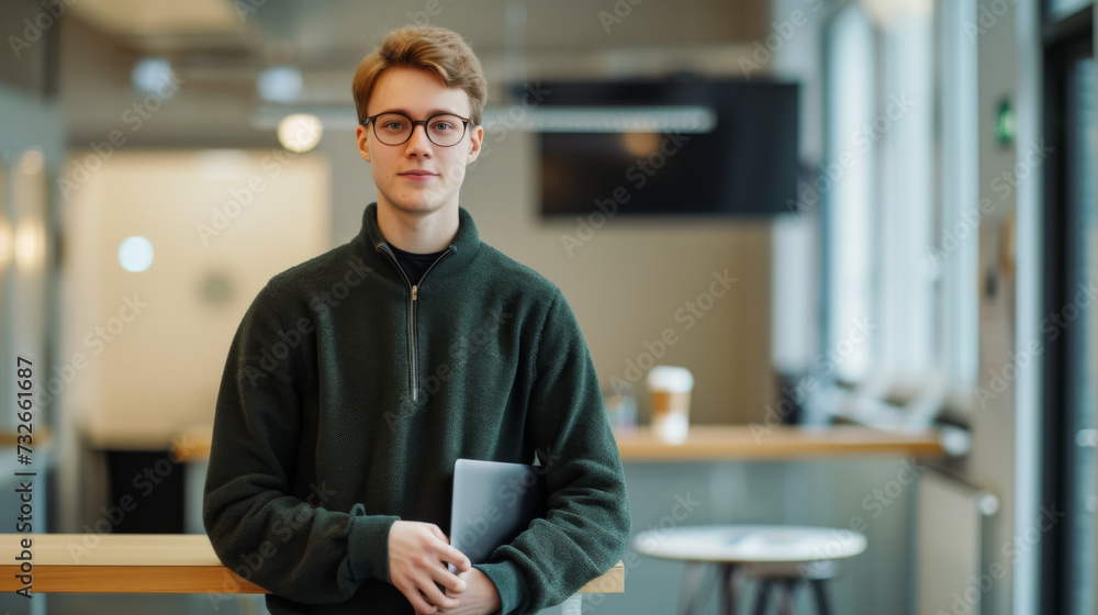A confident man stands with arms crossed in a modern office environment, embodying leadership and professionalism with his team in the background. A confident man stands with arms crossed in a modern office environment, embodying leadership and professionalism with his team in the background.