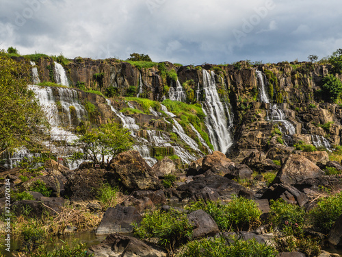 Pongour  Elephant  waterfall near Dalat  Vietnam. Beautiful waterfall. Dramatic sky over Pongour Falls. Famous and most beautiful of fall in Vietnam.