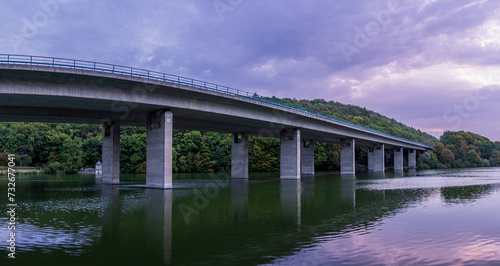 Bridge over the lake in the evening. Panoramic view. © PeterPike