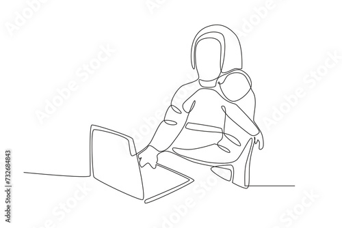 A mother who is working in the office