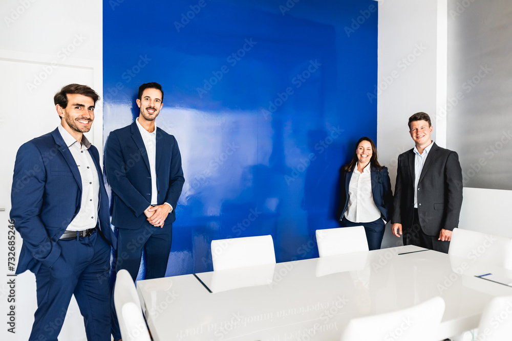 Business team standing in front of camera during meeting work - Entrepreneurship concept