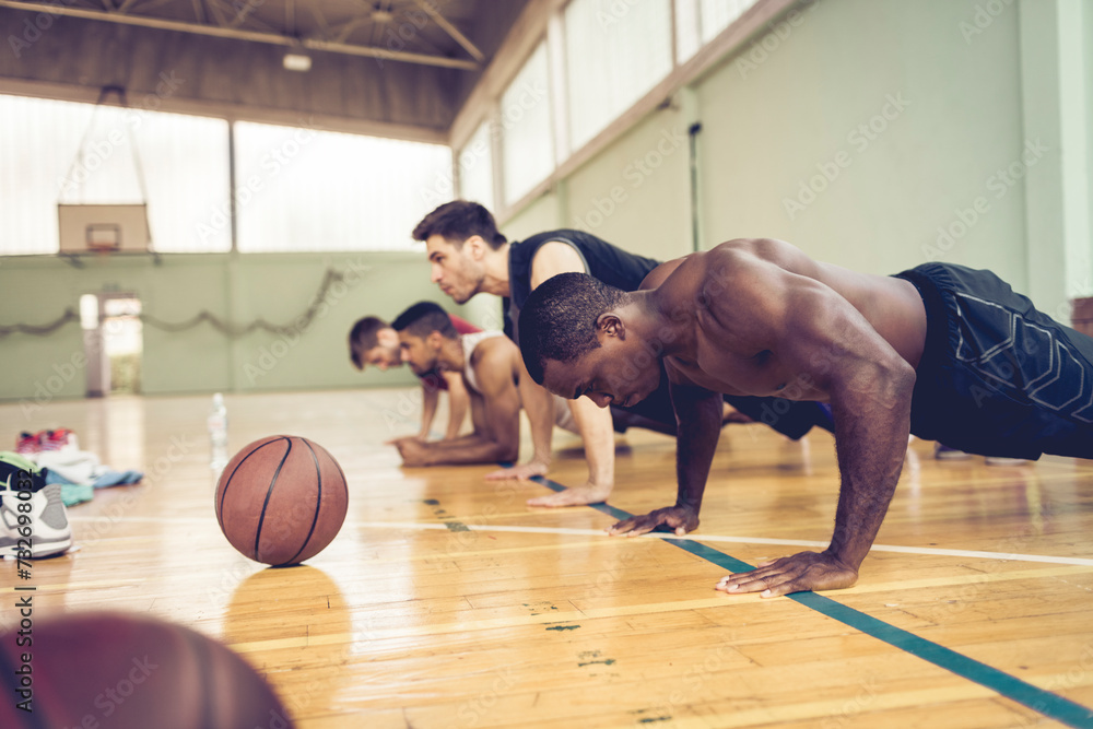© Marko Geber - Men laughing and resting during gym workout © Marko Geber - Men laughing and resting during gym workout