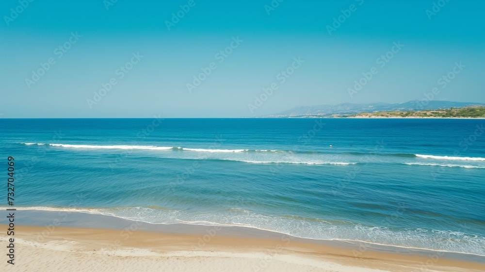 landscape of blue sea with white sand and small waves, ideal place to relax