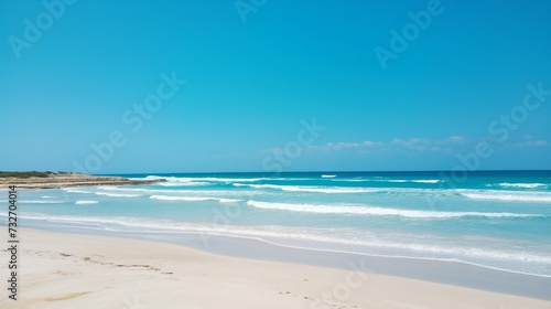 landscape of blue sea with white sand and small waves  ideal place to relax