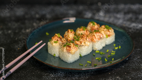 Sushi rolls are served on a plate. soy sauce. Delicious seafood food.