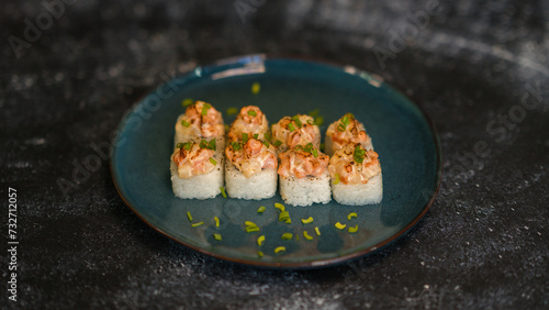 Sushi rolls are served on a plate. soy sauce. Delicious seafood food.