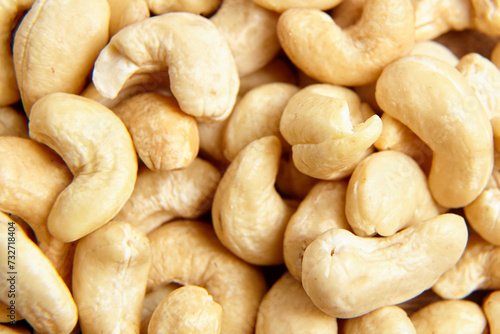 Cashew nut heap food texture background, macro shot. Cashew pile, closeup shot photo