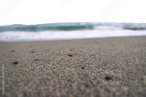 Sea sand beach with foam and waves on white background. Sand beach surface with selective focus png photo.