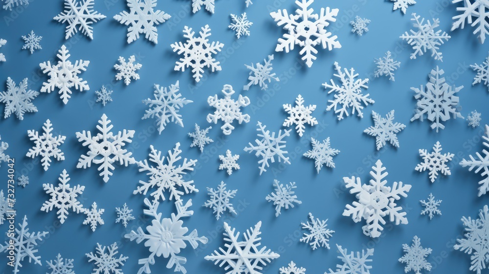 Hand-Made Paper Snowflakes on Blue Background - A Festive Group of many Snowflakes Hand-Made Paper Snowflakes on Blue Background - A Festive Group of many Snowflakes