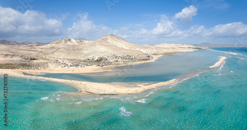 Obraz na płótnie Playa de Sotavento, Fuerteventura: a breathtaking aerial view of crystal-clear lagoons and sweeping sand dunes on this iconic Canary beach. w salonie