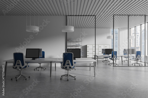 Modern office business interior with coworking zone and panoramic window