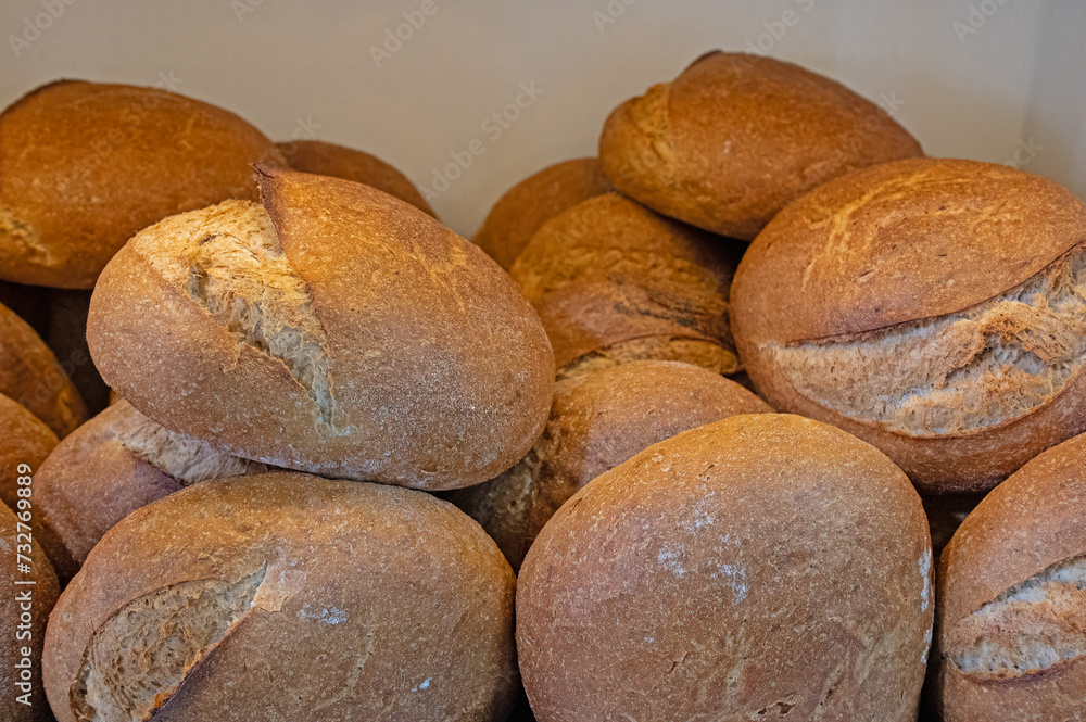 Round bread sold on the counter at the baker's shop.