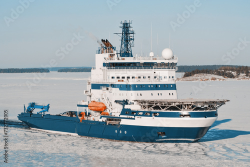 Icebreaker Vessel On Duty For Icebreaking Services For Safe Navigation. Operations In Arctic Areas. Ship With Helicopter Deck