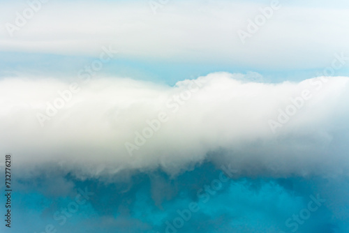 White cloud on blue pre-storm sky in New York, USA, background, weather