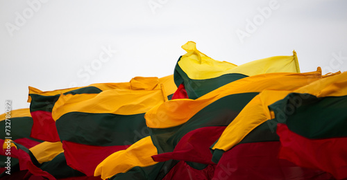 Obraz na płótnie The national flag of Lithuania flutters in the wind