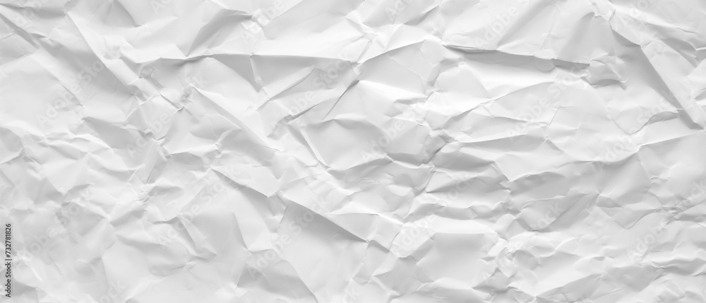 Obraz premium Crumpled, crinkled white office paper. Sharp textures and contrast. Graphic resource background and wallpaper.